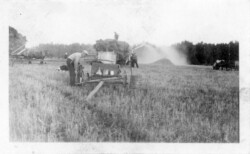 Saskatchewan, Sept. 24, 1939 Nick J Chernoff operating machinery. Nick J Chernoff operating machinery.
