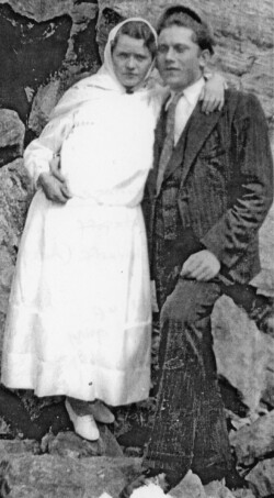 Mabel Potapoff and Pete J Chernoff (age 18?) Married in 1939 at Fruitova Village May 14. All Dressed up and coming or going to a meeting up on the hillside aove Sirotskiya. Everyone gathered there, younger generation. There was nothing else to do except go to the meeting. Taken below R.R. tracks in the rocks. Mabel Potapoff and Pete J Chernof