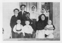 1922 Taken at Khutor Ranch near Veregin Saskatchewan - John N. Chernoff and Hanyia N. Semenoff's Family
Back Row: Nick J., John J., Mabel J., Cousin Annie Zeeben (through Hanya's sister Maria Semenoff who married a Zeeben - Annie married George Konkin, she is Max Z's sister), Middle row: John N., Hanyia N. Front: Peter J., Sam J., Harry J. on mom's lap. she ) Middle John N Chernoff, wife Hanya/Helen Semenoff, front Pete, Sam, Harry on knee