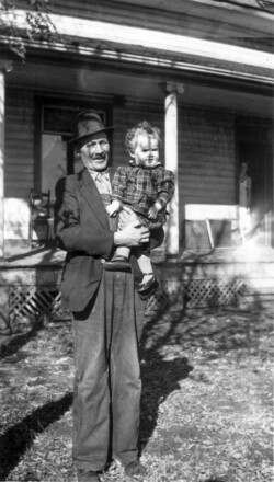 Florence Chernoff with grandfather John (Vanya) N Chernoff. 1941, Oct 12. Veregin Saskatchewan. Florence Chernoff with grandfather John